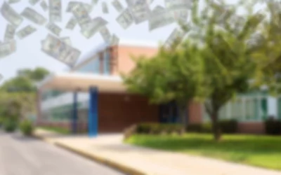 How much money did the top ten ranking high schools spend per student?
